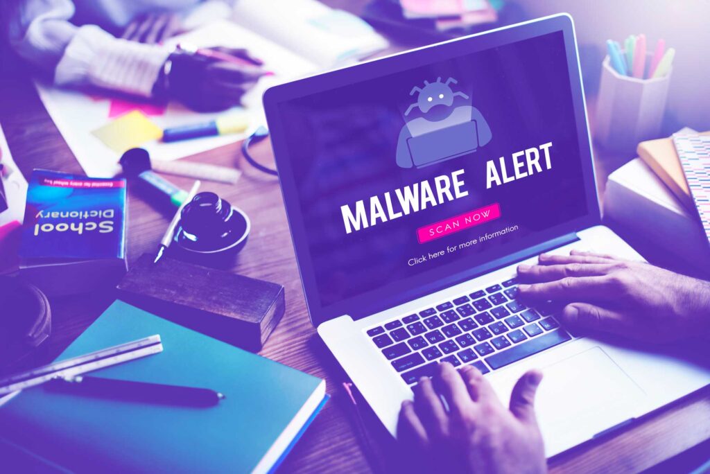 Computer showing malware alert